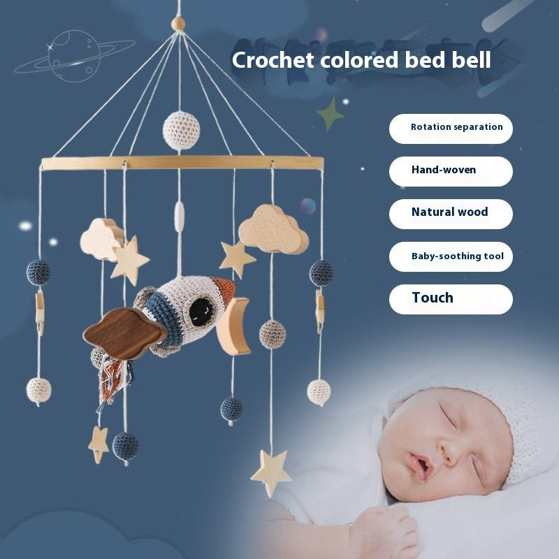 Baby mobile made of braided cotton and wood